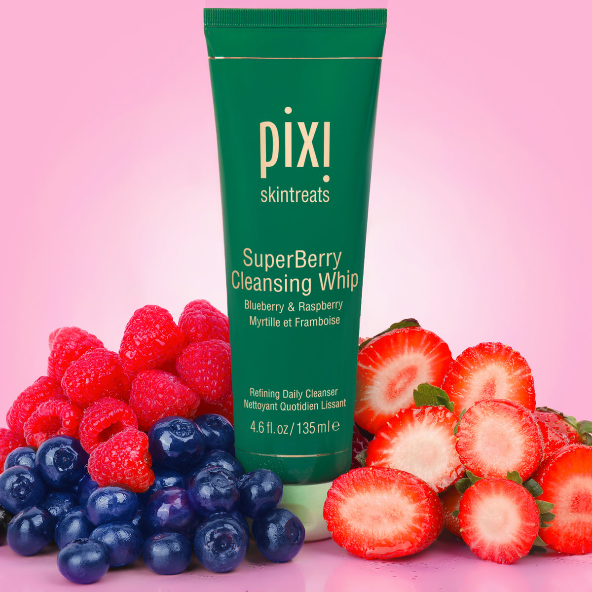 Pixi SuperBerry Cleansing Whip with berries on a pink background